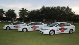 Our cars are white, but we are green, meaning hybrid